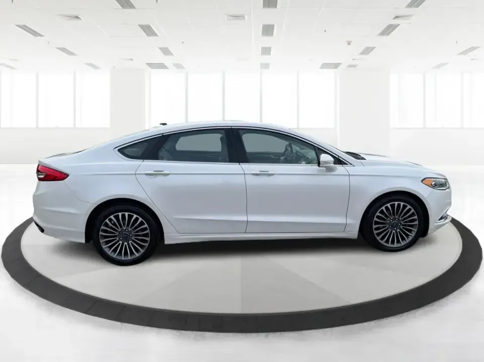 2017 Ford Fusion SE (3FA6P0T99HR) with an EcoBoost 2L I-4 gasoline direct injection engine, 6A transmission, located at 1230 East Main St, Xenia, OH, 45385, (937) 908-9800, 39.688026, -83.910172 - Built for real life in the Miami Valley-school drop-offs, long commutes, and weekend getaways-this 2017 Ford Fusion SE is the kind of sedan that fits smoothly into a busy schedule while still feeling comfortable and confident on the road. Finished in crisp Oxford White, it's a smart pick for commute- Photo#1