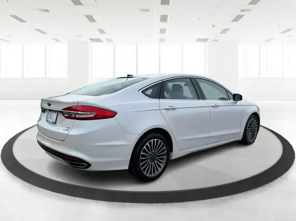 2017 Ford Fusion SE (3FA6P0T99HR) with an EcoBoost 2L I-4 gasoline direct injection engine, 6A transmission, located at 1230 East Main St, Xenia, OH, 45385, (937) 908-9800, 39.688026, -83.910172 - Built for real life in the Miami Valley-school drop-offs, long commutes, and weekend getaways-this 2017 Ford Fusion SE is the kind of sedan that fits smoothly into a busy schedule while still feeling comfortable and confident on the road. Finished in crisp Oxford White, it's a smart pick for commute- Photo#2