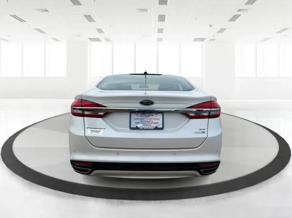 2017 Ford Fusion SE (3FA6P0T99HR) with an EcoBoost 2L I-4 gasoline direct injection engine, 6A transmission, located at 1230 East Main St, Xenia, OH, 45385, (937) 908-9800, 39.688026, -83.910172 - Built for real life in the Miami Valley-school drop-offs, long commutes, and weekend getaways-this 2017 Ford Fusion SE is the kind of sedan that fits smoothly into a busy schedule while still feeling comfortable and confident on the road. Finished in crisp Oxford White, it's a smart pick for commute- Photo#3