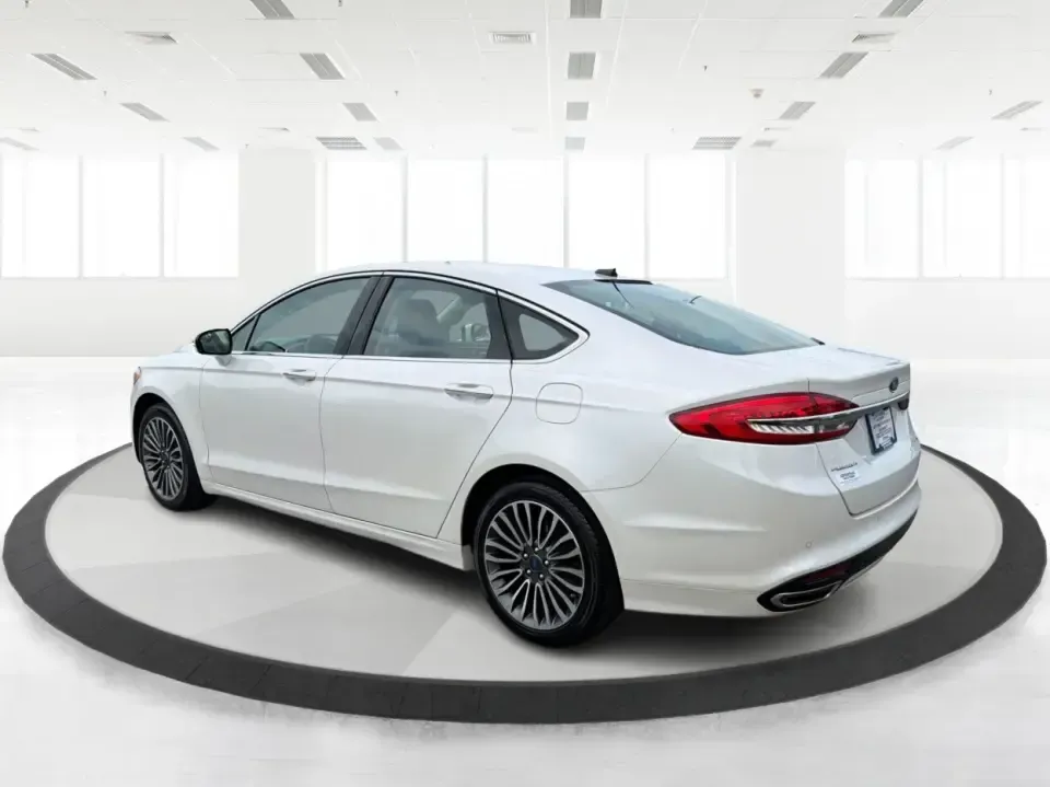 2017 Ford Fusion SE (3FA6P0T99HR) with an EcoBoost 2L I-4 gasoline direct injection engine, 6A transmission, located at 1230 East Main St, Xenia, OH, 45385, (937) 908-9800, 39.688026, -83.910172 - Built for real life in the Miami Valley-school drop-offs, long commutes, and weekend getaways-this 2017 Ford Fusion SE is the kind of sedan that fits smoothly into a busy schedule while still feeling comfortable and confident on the road. Finished in crisp Oxford White, it's a smart pick for commute- Photo#4