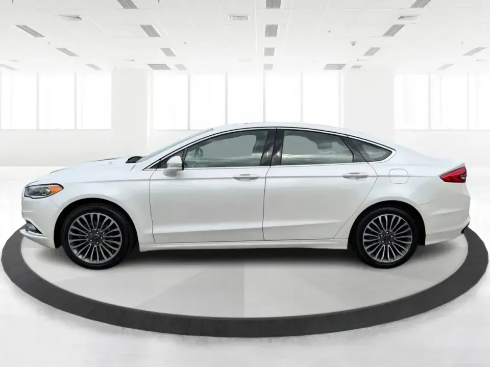 2017 Ford Fusion SE (3FA6P0T99HR) with an EcoBoost 2L I-4 gasoline direct injection engine, 6A transmission, located at 1230 East Main St, Xenia, OH, 45385, (937) 908-9800, 39.688026, -83.910172 - Built for real life in the Miami Valley-school drop-offs, long commutes, and weekend getaways-this 2017 Ford Fusion SE is the kind of sedan that fits smoothly into a busy schedule while still feeling comfortable and confident on the road. Finished in crisp Oxford White, it's a smart pick for commute- Photo#5