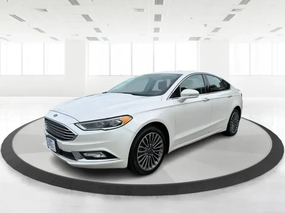 2017 Ford Fusion SE (3FA6P0T99HR) with an EcoBoost 2L I-4 gasoline direct injection engine, 6A transmission, located at 1230 East Main St, Xenia, OH, 45385, (937) 908-9800, 39.688026, -83.910172 - Built for real life in the Miami Valley-school drop-offs, long commutes, and weekend getaways-this 2017 Ford Fusion SE is the kind of sedan that fits smoothly into a busy schedule while still feeling comfortable and confident on the road. Finished in crisp Oxford White, it's a smart pick for commute- Photo#8