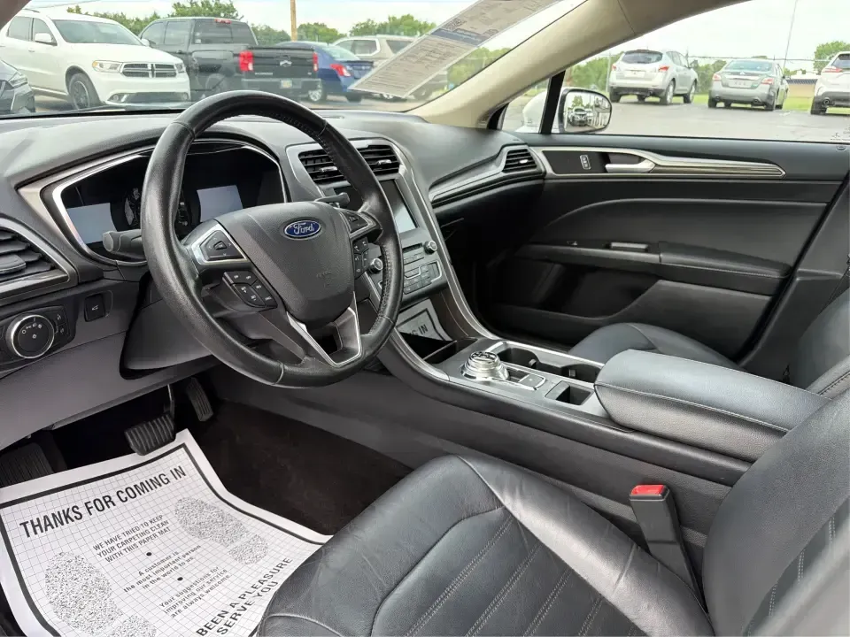 2017 Ford Fusion SE (3FA6P0T99HR) with an EcoBoost 2L I-4 gasoline direct injection engine, 6A transmission, located at 1230 East Main St, Xenia, OH, 45385, (937) 908-9800, 39.688026, -83.910172 - Built for real life in the Miami Valley-school drop-offs, long commutes, and weekend getaways-this 2017 Ford Fusion SE is the kind of sedan that fits smoothly into a busy schedule while still feeling comfortable and confident on the road. Finished in crisp Oxford White, it's a smart pick for commute- Photo#9
