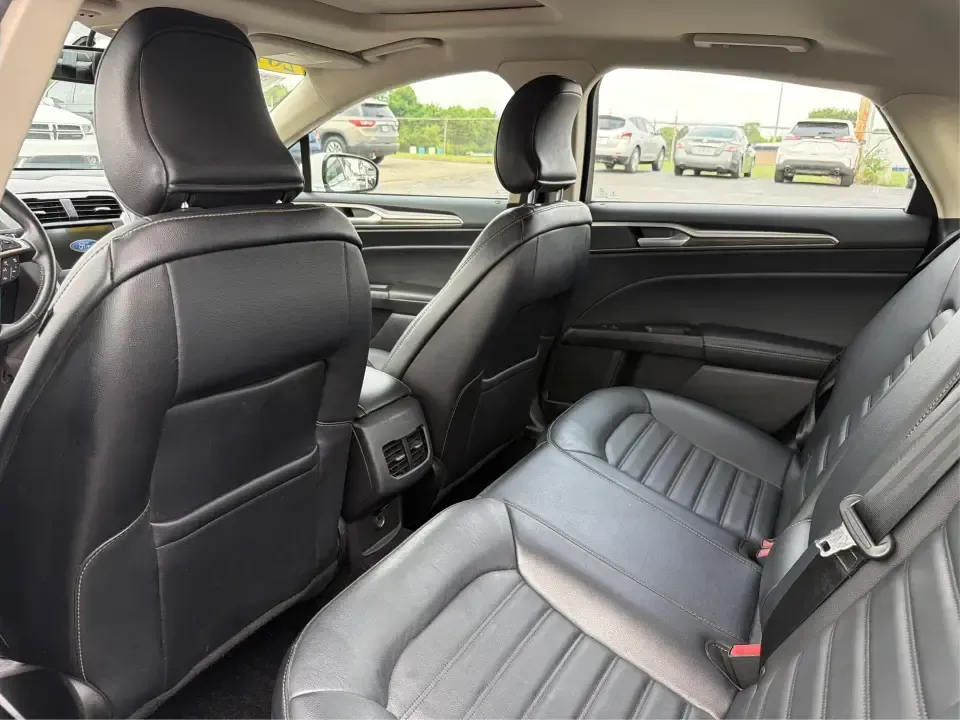 2017 Ford Fusion SE (3FA6P0T99HR) with an EcoBoost 2L I-4 gasoline direct injection engine, 6A transmission, located at 1230 East Main St, Xenia, OH, 45385, (937) 908-9800, 39.688026, -83.910172 - Built for real life in the Miami Valley-school drop-offs, long commutes, and weekend getaways-this 2017 Ford Fusion SE is the kind of sedan that fits smoothly into a busy schedule while still feeling comfortable and confident on the road. Finished in crisp Oxford White, it's a smart pick for commute- Photo#10