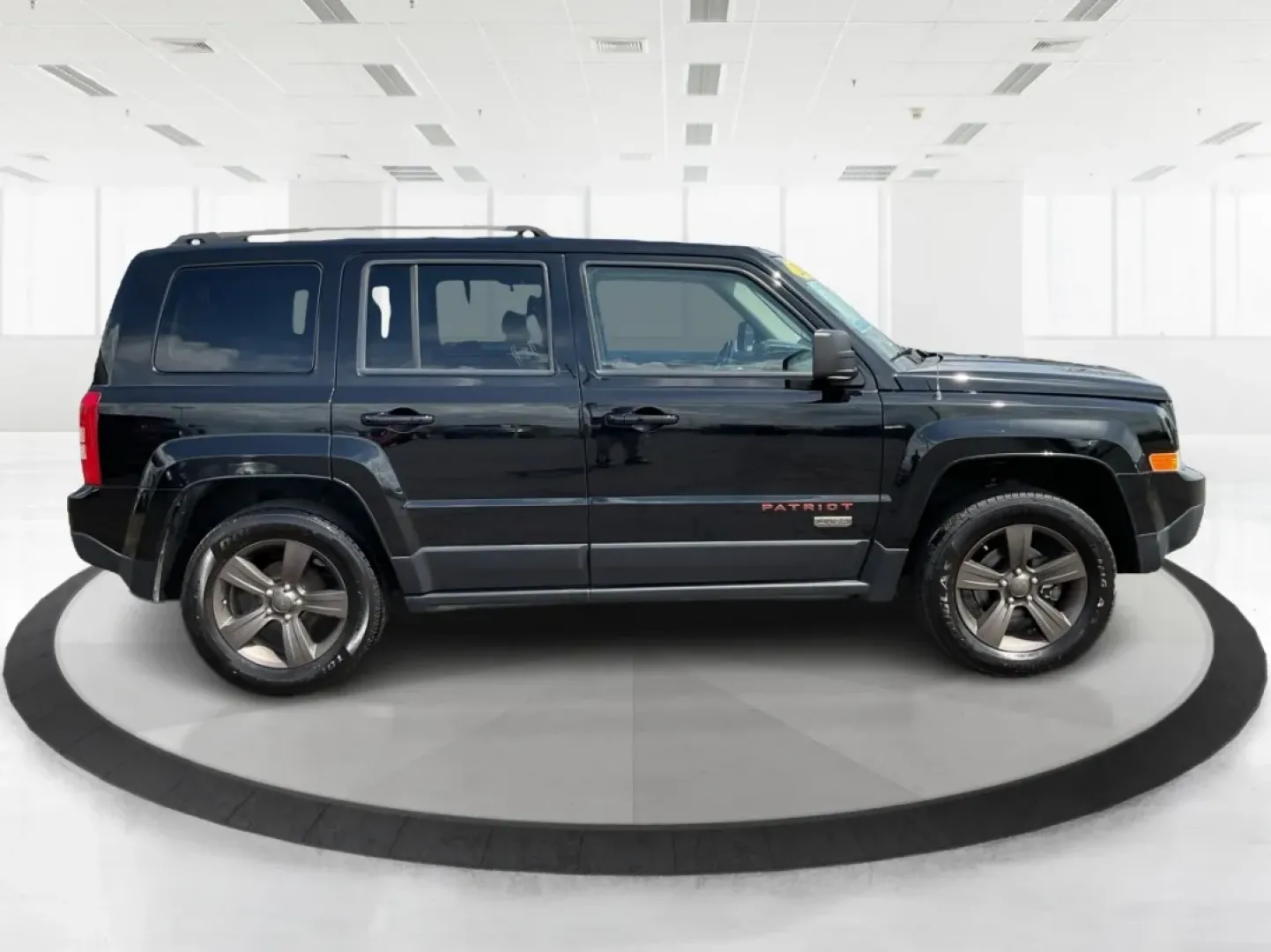 2016 Jeep Patriot 75th Anniversary (1C4NJPBBXGD) with an 2.4L I-4 DOHC engine, located at 401 Woodman Dr, Riverside, OH, 45431, (937) 908-9800, 39.760899, -84.123421 - **Discover Your Next Adventure with the 2016 Jeep Patriot 75th Anniversary Edition!**<br /> <br /> Are you ready to embark on your next road trip or weekend adventure? The 2016 Jeep Patriot 75th Anniversary Edition is the perfect vehicle for those who crave exploration while enjoying the comforts of - Photo#1
