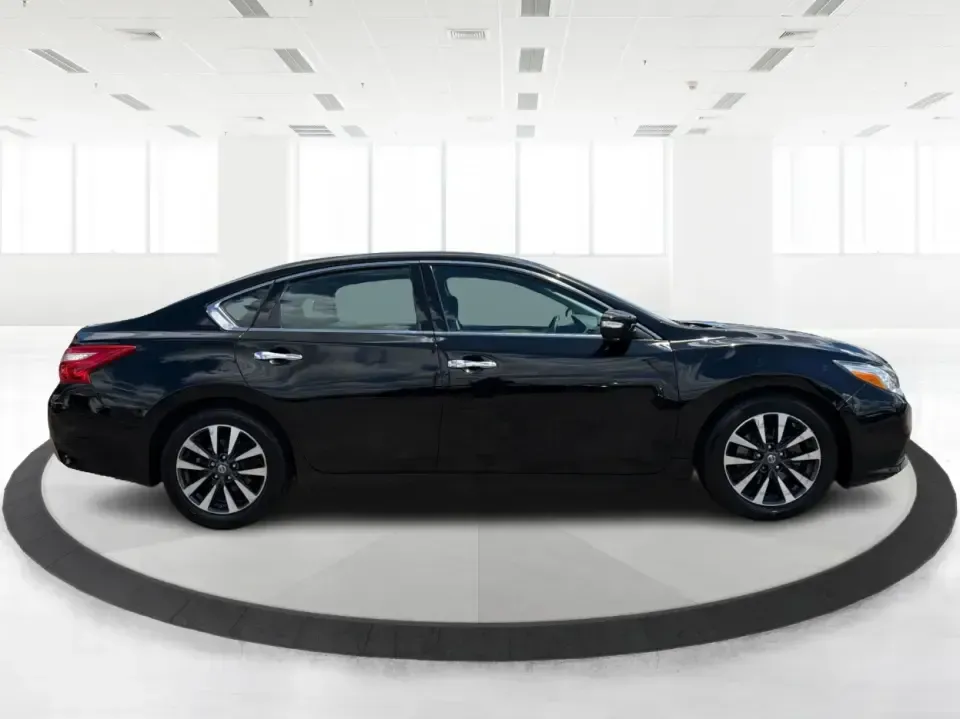 2017 Nissan Altima 2.5 SV (1N4AL3AP8HC) with an 2.5L I-4 DOHC engine, CVT transmission, located at 4508 South Dixie Dr, Moraine, OH, 45439, (937) 908-9800, 39.689976, -84.218452 - Need a reliable daily driver for I-75 commutes, Wright-Patterson AFB runs, or quick family errands around Dayton? This 2017 Nissan Altima 2.5 SV in Super Black is a smart, comfortable sedan that fits real life in Moraine-easy to park, efficient to live with, and roomy enough for carpools, groceries,- Photo#1