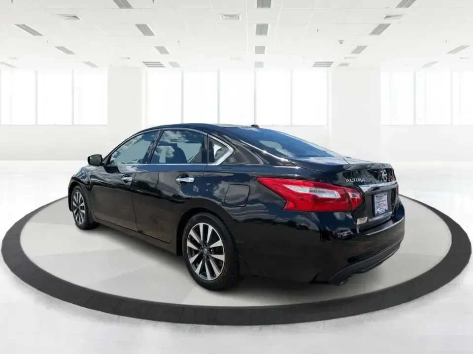 2017 Nissan Altima 2.5 SV (1N4AL3AP8HC) with an 2.5L I-4 DOHC engine, CVT transmission, located at 4508 South Dixie Dr, Moraine, OH, 45439, (937) 908-9800, 39.689976, -84.218452 - Need a reliable daily driver for I-75 commutes, Wright-Patterson AFB runs, or quick family errands around Dayton? This 2017 Nissan Altima 2.5 SV in Super Black is a smart, comfortable sedan that fits real life in Moraine-easy to park, efficient to live with, and roomy enough for carpools, groceries,- Photo#4