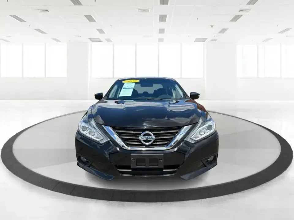 2017 Nissan Altima 2.5 SV (1N4AL3AP8HC) with an 2.5L I-4 DOHC engine, CVT transmission, located at 4508 South Dixie Dr, Moraine, OH, 45439, (937) 908-9800, 39.689976, -84.218452 - Need a reliable daily driver for I-75 commutes, Wright-Patterson AFB runs, or quick family errands around Dayton? This 2017 Nissan Altima 2.5 SV in Super Black is a smart, comfortable sedan that fits real life in Moraine-easy to park, efficient to live with, and roomy enough for carpools, groceries,- Photo#7