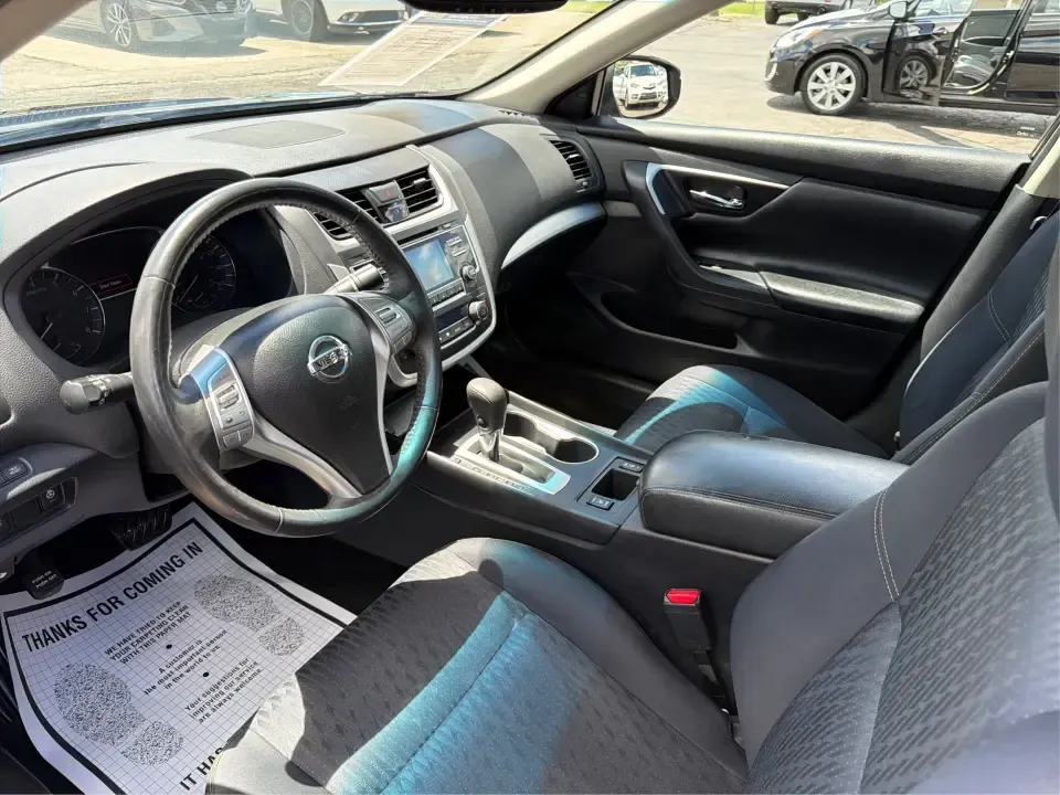 2017 Nissan Altima 2.5 SV (1N4AL3AP8HC) with an 2.5L I-4 DOHC engine, CVT transmission, located at 4508 South Dixie Dr, Moraine, OH, 45439, (937) 908-9800, 39.689976, -84.218452 - Need a reliable daily driver for I-75 commutes, Wright-Patterson AFB runs, or quick family errands around Dayton? This 2017 Nissan Altima 2.5 SV in Super Black is a smart, comfortable sedan that fits real life in Moraine-easy to park, efficient to live with, and roomy enough for carpools, groceries,- Photo#9