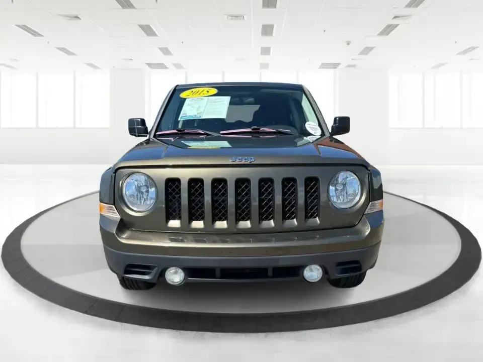 2015 Jeep Patriot High Altitude Edition (1C4NJRFB3FD) with an 2.4L I-4 DOHC engine, located at 401 Woodman Dr, Riverside, OH, 45431, (937) 908-9800, 39.760899, -84.123421 - Weekend trailheads, snowy school drop-offs, and everyday commutes across the Miami Valley all call for an SUV that's ready when your plans change. This 2015 Jeep Patriot High Altitude Edition in Maximum Steel Metallic Clearcoat is a smart pick for drivers who want Jeep style, practical size, and con- Photo#7