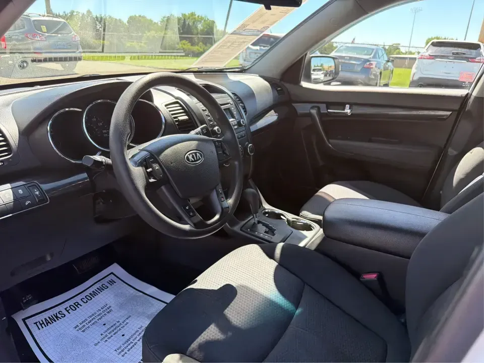 2013 Kia Sorento LX (5XYKT3A17DG) with an 2.4L I-4 DOHC engine, 6-Speed Automatic transmission, located at 401 Woodman Dr, Riverside, OH, 45431, (937) 908-9800, 39.760899, -84.123421 - Pack up the kids, load the groceries, or point the GPS toward a weekend getaway-this 2013 Kia Sorento LX is the kind of practical SUV that fits real life in Riverside, Ohio. With confident road manners for daily commuting and flexible space for road trips, it's a smart choice for growing families, b- Photo#9
