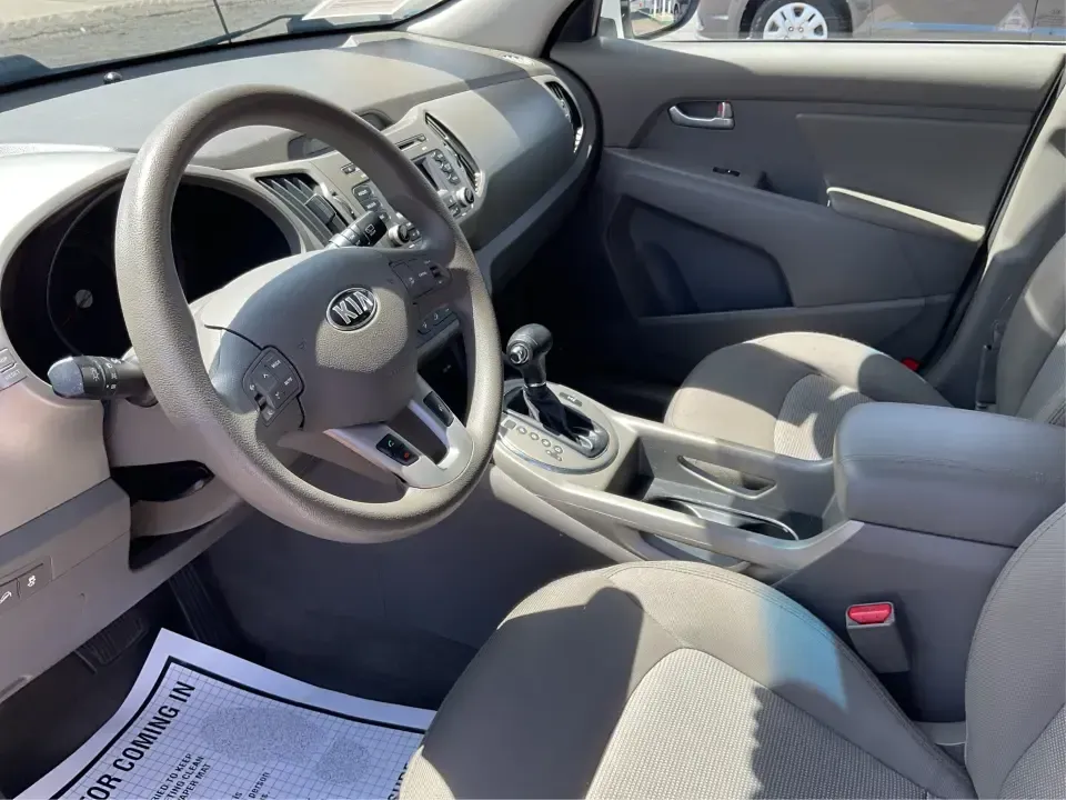 2015 Kia Sportage LX (KNDPBCAC7F7) with an 2.4L V6 DOHC 24V engine, 6-Speed Automatic transmission, located at 4508 South Dixie Dr, Moraine, OH, 45439, (937) 908-9800, 39.689976, -84.218452 - **Explore the Open Road with the 2015 Kia Sportage LX Perfect for Your Next Adventure!**<br /> <br /> Imagine hitting the open road with your loved ones, whether it's a weekend getaway or a daily commute. The 2015 Kia Sportage LX, available at Advantage Car and Credit in Fairborn, OH, is the ideal - Photo#9