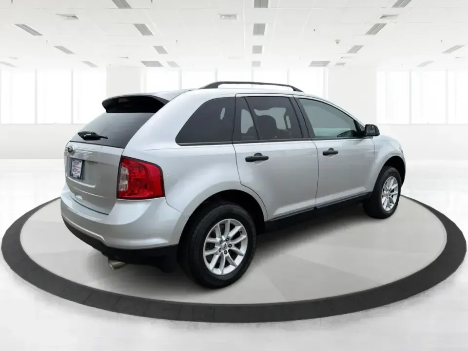 2014 Ford Edge SE FWD (2FMDK3GC0EB) with an 3.5L V6 DOHC 24V engine, 6-Speed Automatic transmission, located at 1951 S Dayton Lakeview Rd., New Carlisle, OH, 45344, (937) 908-9800, 39.890999, -84.050255 - Picture your next week unfolding with less stress and more freedom: a comfortable SUV for the school run, an easy commuter for I70 and OH235, and a road-trip-ready ride for weekend escapes to John Bryan State Park or a day in downtown Springfield. This 2014 Ford Edge SE FWD blends family-friendly sp- Photo#2