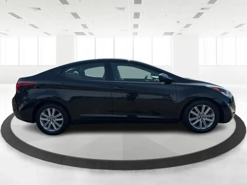 2016 Hyundai Elantra Limited (5NPDH4AE8GH) with an 1.8L L4 DOHC 16V engine, 6-Speed Automatic transmission, located at 4508 South Dixie Dr, Moraine, OH, 45439, (937) 908-9800, 39.689976, -84.218452 - Picture an easy weekday routine: a comfortable, fuel-sipping sedan for the commute down South Dixie Drive, quick school drop-offs, and a smooth Friday escape to Carillon Historical Park or a Dayton Dragons game. This **2016 Hyundai Elantra Limited** in **Phantom Black** is the kind of practical, pol- Photo#1