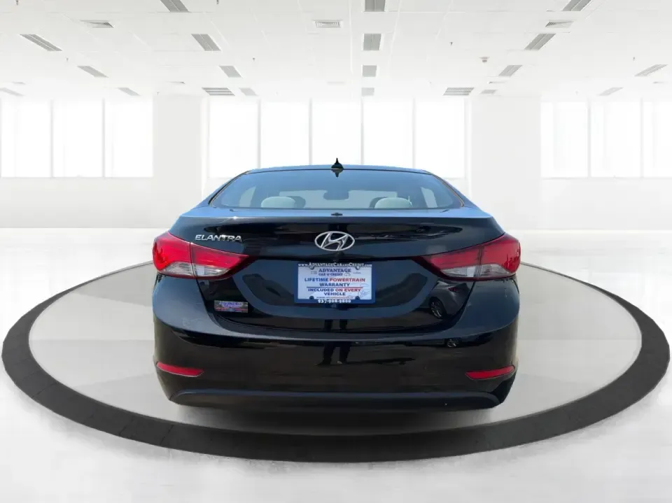 2016 Hyundai Elantra Limited (5NPDH4AE8GH) with an 1.8L L4 DOHC 16V engine, 6-Speed Automatic transmission, located at 4508 South Dixie Dr, Moraine, OH, 45439, (937) 908-9800, 39.689976, -84.218452 - Picture an easy weekday routine: a comfortable, fuel-sipping sedan for the commute down South Dixie Drive, quick school drop-offs, and a smooth Friday escape to Carillon Historical Park or a Dayton Dragons game. This **2016 Hyundai Elantra Limited** in **Phantom Black** is the kind of practical, pol- Photo#3