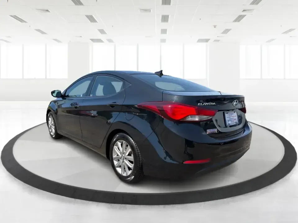 2016 Hyundai Elantra Limited (5NPDH4AE8GH) with an 1.8L L4 DOHC 16V engine, 6-Speed Automatic transmission, located at 4508 South Dixie Dr, Moraine, OH, 45439, (937) 908-9800, 39.689976, -84.218452 - Picture an easy weekday routine: a comfortable, fuel-sipping sedan for the commute down South Dixie Drive, quick school drop-offs, and a smooth Friday escape to Carillon Historical Park or a Dayton Dragons game. This **2016 Hyundai Elantra Limited** in **Phantom Black** is the kind of practical, pol- Photo#4