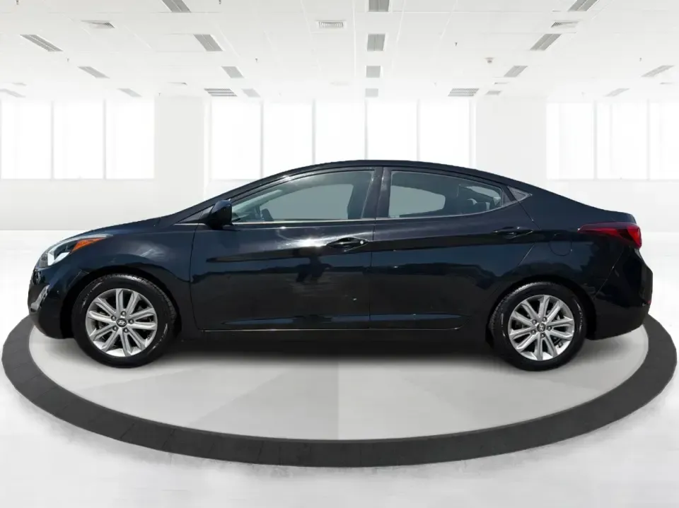 2016 Hyundai Elantra Limited (5NPDH4AE8GH) with an 1.8L L4 DOHC 16V engine, 6-Speed Automatic transmission, located at 4508 South Dixie Dr, Moraine, OH, 45439, (937) 908-9800, 39.689976, -84.218452 - Picture an easy weekday routine: a comfortable, fuel-sipping sedan for the commute down South Dixie Drive, quick school drop-offs, and a smooth Friday escape to Carillon Historical Park or a Dayton Dragons game. This **2016 Hyundai Elantra Limited** in **Phantom Black** is the kind of practical, pol- Photo#5