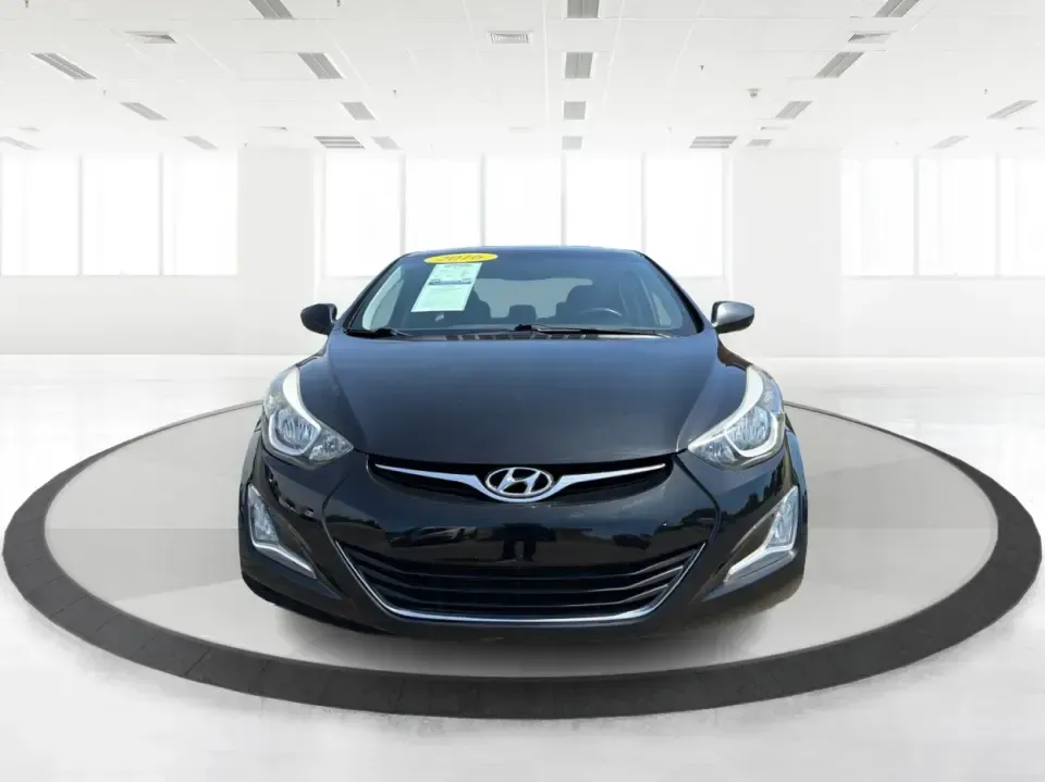 2016 Hyundai Elantra Limited (5NPDH4AE8GH) with an 1.8L L4 DOHC 16V engine, 6-Speed Automatic transmission, located at 4508 South Dixie Dr, Moraine, OH, 45439, (937) 908-9800, 39.689976, -84.218452 - Picture an easy weekday routine: a comfortable, fuel-sipping sedan for the commute down South Dixie Drive, quick school drop-offs, and a smooth Friday escape to Carillon Historical Park or a Dayton Dragons game. This **2016 Hyundai Elantra Limited** in **Phantom Black** is the kind of practical, pol- Photo#7