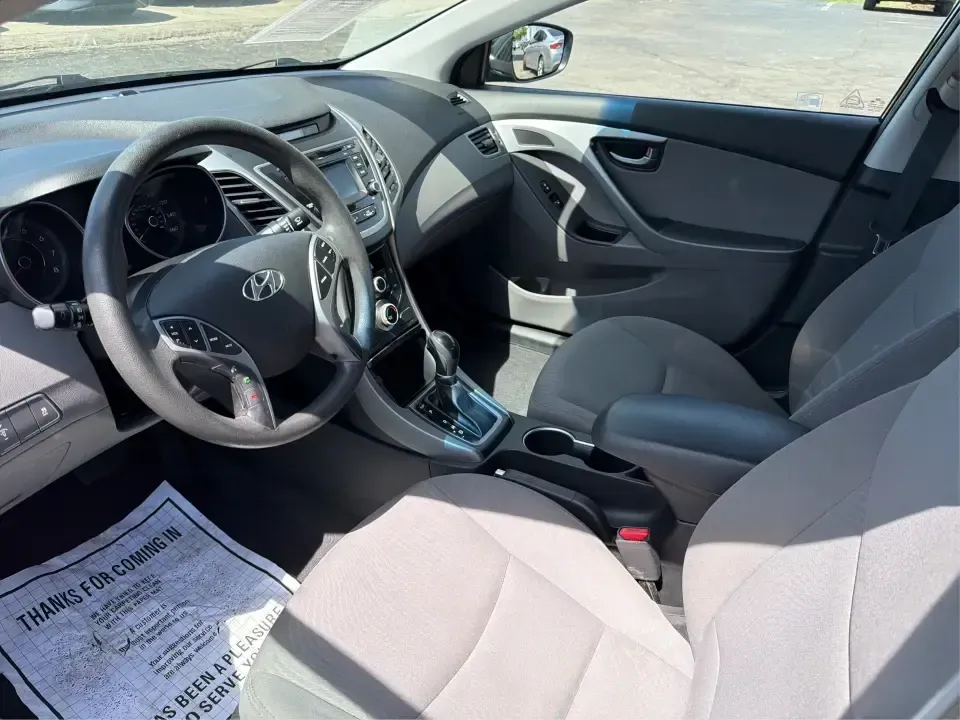 2016 Hyundai Elantra Limited (5NPDH4AE8GH) with an 1.8L L4 DOHC 16V engine, 6-Speed Automatic transmission, located at 4508 South Dixie Dr, Moraine, OH, 45439, (937) 908-9800, 39.689976, -84.218452 - Picture an easy weekday routine: a comfortable, fuel-sipping sedan for the commute down South Dixie Drive, quick school drop-offs, and a smooth Friday escape to Carillon Historical Park or a Dayton Dragons game. This **2016 Hyundai Elantra Limited** in **Phantom Black** is the kind of practical, pol- Photo#9