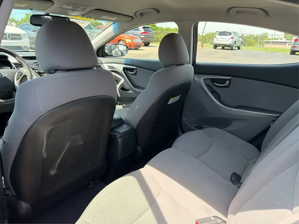 2016 Hyundai Elantra Limited (5NPDH4AE8GH) with an 1.8L L4 DOHC 16V engine, 6-Speed Automatic transmission, located at 4508 South Dixie Dr, Moraine, OH, 45439, (937) 908-9800, 39.689976, -84.218452 - Picture an easy weekday routine: a comfortable, fuel-sipping sedan for the commute down South Dixie Drive, quick school drop-offs, and a smooth Friday escape to Carillon Historical Park or a Dayton Dragons game. This **2016 Hyundai Elantra Limited** in **Phantom Black** is the kind of practical, pol- Photo#10