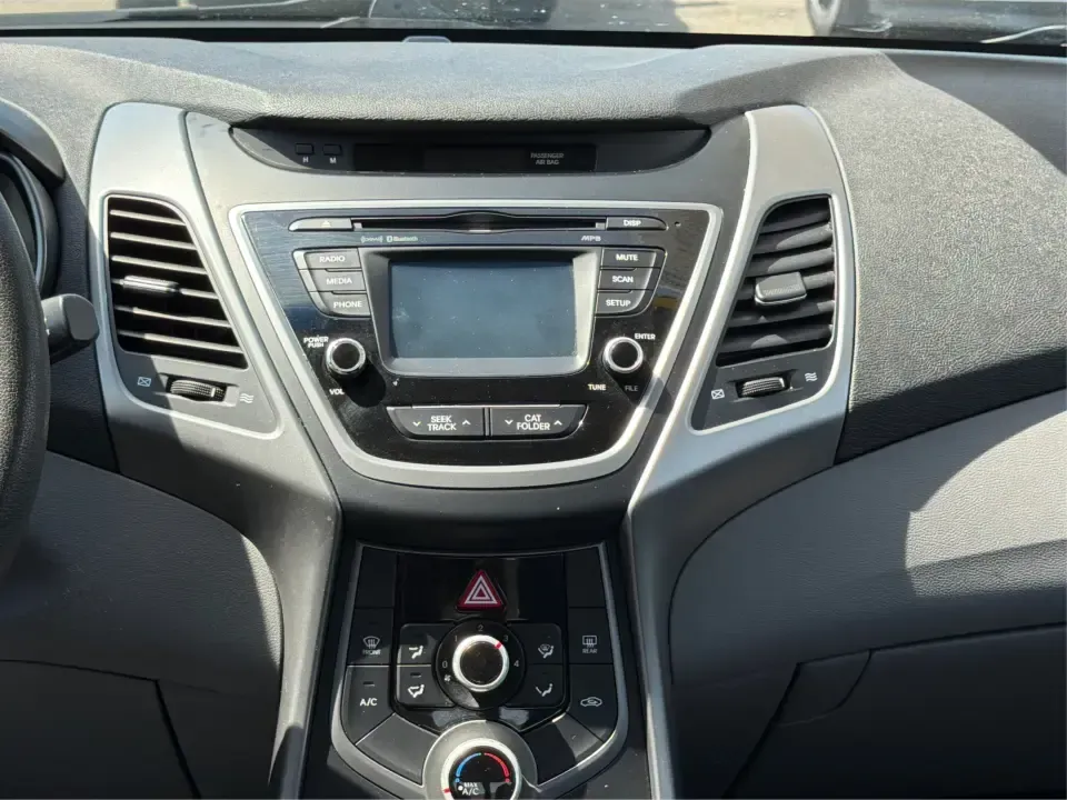 2016 Hyundai Elantra Limited (5NPDH4AE8GH) with an 1.8L L4 DOHC 16V engine, 6-Speed Automatic transmission, located at 4508 South Dixie Dr, Moraine, OH, 45439, (937) 908-9800, 39.689976, -84.218452 - Picture an easy weekday routine: a comfortable, fuel-sipping sedan for the commute down South Dixie Drive, quick school drop-offs, and a smooth Friday escape to Carillon Historical Park or a Dayton Dragons game. This **2016 Hyundai Elantra Limited** in **Phantom Black** is the kind of practical, pol- Photo#13