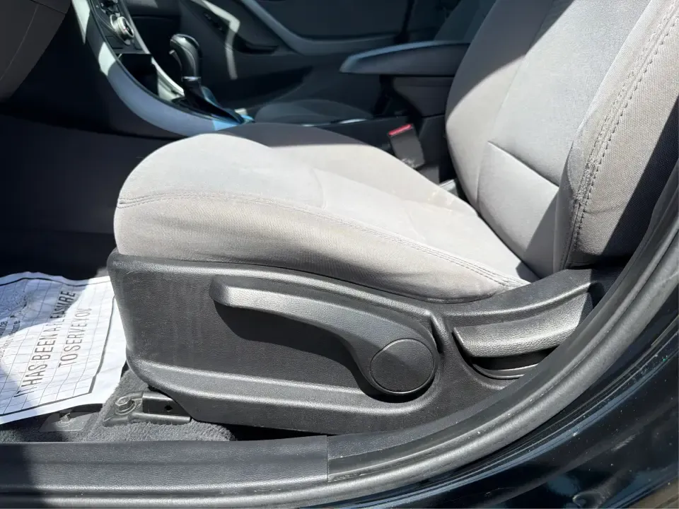 2016 Hyundai Elantra Limited (5NPDH4AE8GH) with an 1.8L L4 DOHC 16V engine, 6-Speed Automatic transmission, located at 4508 South Dixie Dr, Moraine, OH, 45439, (937) 908-9800, 39.689976, -84.218452 - Picture an easy weekday routine: a comfortable, fuel-sipping sedan for the commute down South Dixie Drive, quick school drop-offs, and a smooth Friday escape to Carillon Historical Park or a Dayton Dragons game. This **2016 Hyundai Elantra Limited** in **Phantom Black** is the kind of practical, pol- Photo#18