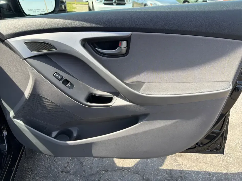 2016 Hyundai Elantra Limited (5NPDH4AE8GH) with an 1.8L L4 DOHC 16V engine, 6-Speed Automatic transmission, located at 4508 South Dixie Dr, Moraine, OH, 45439, (937) 908-9800, 39.689976, -84.218452 - Picture an easy weekday routine: a comfortable, fuel-sipping sedan for the commute down South Dixie Drive, quick school drop-offs, and a smooth Friday escape to Carillon Historical Park or a Dayton Dragons game. This **2016 Hyundai Elantra Limited** in **Phantom Black** is the kind of practical, pol- Photo#20