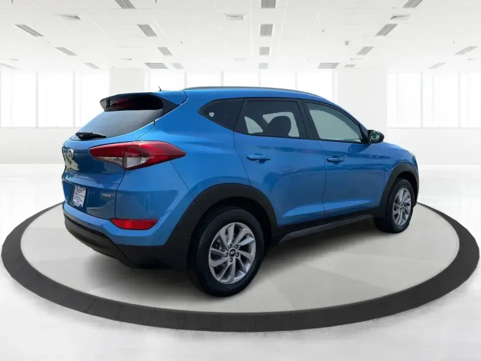 2016 Hyundai Tucson SE w/Preferred Package AWD (KM8J3CA41GU) with an 2.0L L4 DOHC 16V engine, 6A transmission, located at 401 Woodman Dr, Riverside, OH, 45431, (937) 908-9800, 39.760899, -84.123421 - Need an SUV that can handle Dayton-area commutes, rainy school drop-offs, and spontaneous weekend getaways without feeling oversized? This 2016 Hyundai Tucson SE w/Preferred Package AWD in eye-catching Caribbean Blue is built for real life-comfortable for daily drives, confident when the weather tur- Photo#2