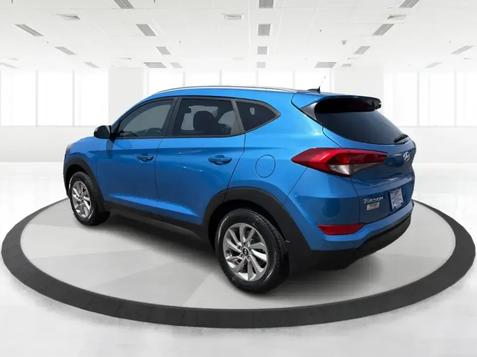 2016 Hyundai Tucson SE w/Preferred Package AWD (KM8J3CA41GU) with an 2.0L L4 DOHC 16V engine, 6A transmission, located at 401 Woodman Dr, Riverside, OH, 45431, (937) 908-9800, 39.760899, -84.123421 - Need an SUV that can handle Dayton-area commutes, rainy school drop-offs, and spontaneous weekend getaways without feeling oversized? This 2016 Hyundai Tucson SE w/Preferred Package AWD in eye-catching Caribbean Blue is built for real life-comfortable for daily drives, confident when the weather tur- Photo#4