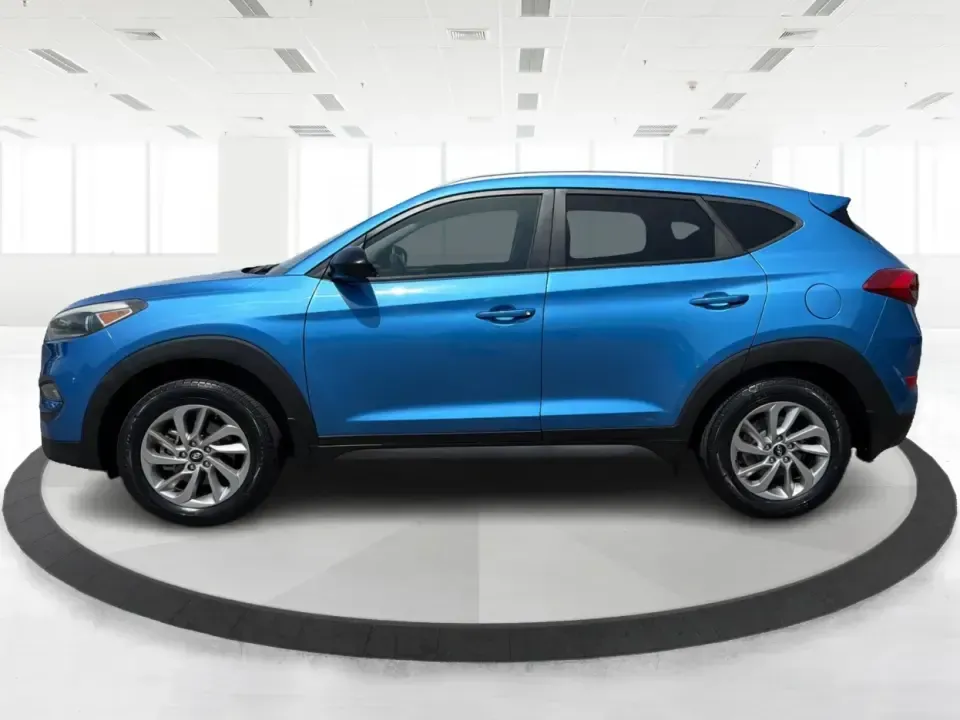 2016 Hyundai Tucson SE w/Preferred Package AWD (KM8J3CA41GU) with an 2.0L L4 DOHC 16V engine, 6A transmission, located at 401 Woodman Dr, Riverside, OH, 45431, (937) 908-9800, 39.760899, -84.123421 - Need an SUV that can handle Dayton-area commutes, rainy school drop-offs, and spontaneous weekend getaways without feeling oversized? This 2016 Hyundai Tucson SE w/Preferred Package AWD in eye-catching Caribbean Blue is built for real life-comfortable for daily drives, confident when the weather tur- Photo#5