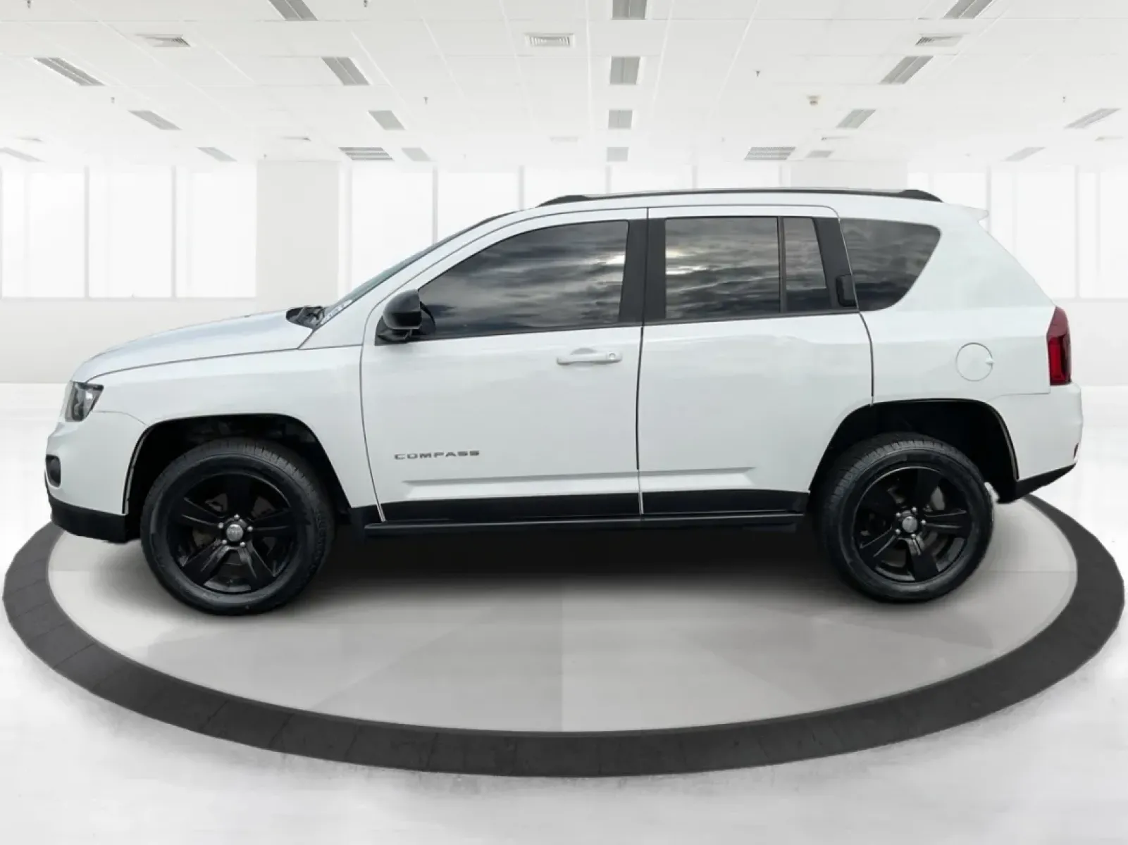 2015 Jeep Compass Sport (1C4NJDBB6FD) with an 2.4L I-4 DOHC engine, located at 880 E. National Road, Vandalia, OH, 45377, (937) 908-9800, 39.891918, -84.183594 - **Explore Adventure and Comfort with the 2015 Jeep Compass Sport at Advantage Car and Credit!**<br /> <br /> Whether you're navigating your daily commute or embarking on a weekend getaway, the 2015 Jeep Compass Sport is designed with versatility in mind. With a spacious interior and rugged capabilit - Photo#5