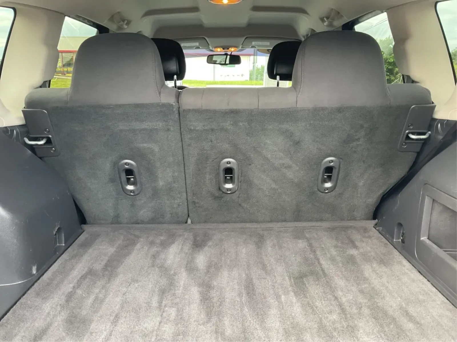 2015 Jeep Compass Sport (1C4NJDBB6FD) with an 2.4L I-4 DOHC engine, located at 880 E. National Road, Vandalia, OH, 45377, (937) 908-9800, 39.891918, -84.183594 - **Explore Adventure and Comfort with the 2015 Jeep Compass Sport at Advantage Car and Credit!**<br /> <br /> Whether you're navigating your daily commute or embarking on a weekend getaway, the 2015 Jeep Compass Sport is designed with versatility in mind. With a spacious interior and rugged capabilit - Photo#12