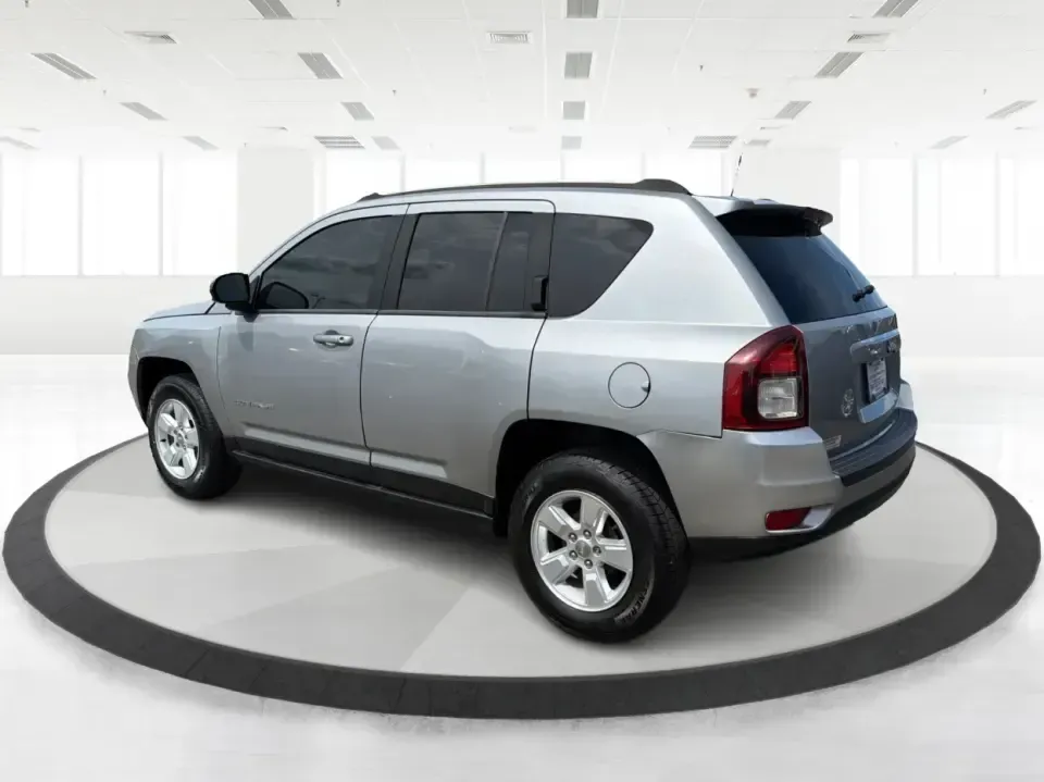2015 Jeep Compass Sport FWD (1C4NJCBA6FD) with an 2.0L L4 DOHC 16V engine, located at 880 E. National Road, Vandalia, OH, 45377, (937) 908-9800, 39.891918, -84.183594 - Weekday commutes down I75, school drop-offs in Butler Township, and quick weekend getaways to the National Museum of the U.S. Air Force or Taylorsville MetroPark all call for an SUV that's easy to live with, comfortable for five, and efficient enough to keep your budget in check. This **2015 Jeep Co- Photo#4