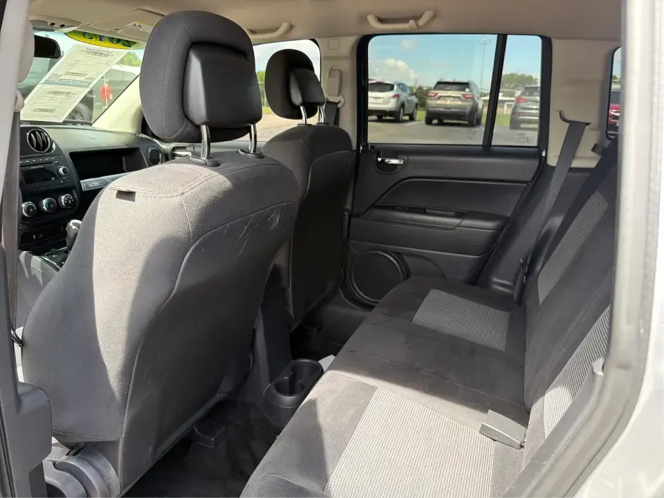 2015 Jeep Compass Sport FWD (1C4NJCBA6FD) with an 2.0L L4 DOHC 16V engine, located at 880 E. National Road, Vandalia, OH, 45377, (937) 908-9800, 39.891918, -84.183594 - Weekday commutes down I75, school drop-offs in Butler Township, and quick weekend getaways to the National Museum of the U.S. Air Force or Taylorsville MetroPark all call for an SUV that's easy to live with, comfortable for five, and efficient enough to keep your budget in check. This **2015 Jeep Co- Photo#10