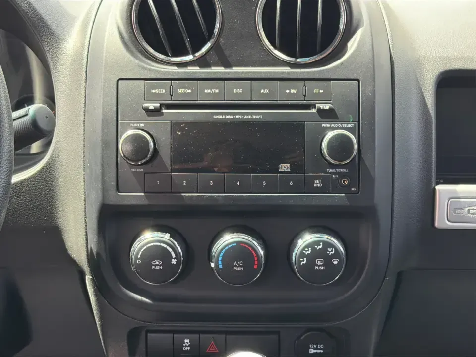 2015 Jeep Compass Sport FWD (1C4NJCBA6FD) with an 2.0L L4 DOHC 16V engine, located at 880 E. National Road, Vandalia, OH, 45377, (937) 908-9800, 39.891918, -84.183594 - Weekday commutes down I75, school drop-offs in Butler Township, and quick weekend getaways to the National Museum of the U.S. Air Force or Taylorsville MetroPark all call for an SUV that's easy to live with, comfortable for five, and efficient enough to keep your budget in check. This **2015 Jeep Co- Photo#13