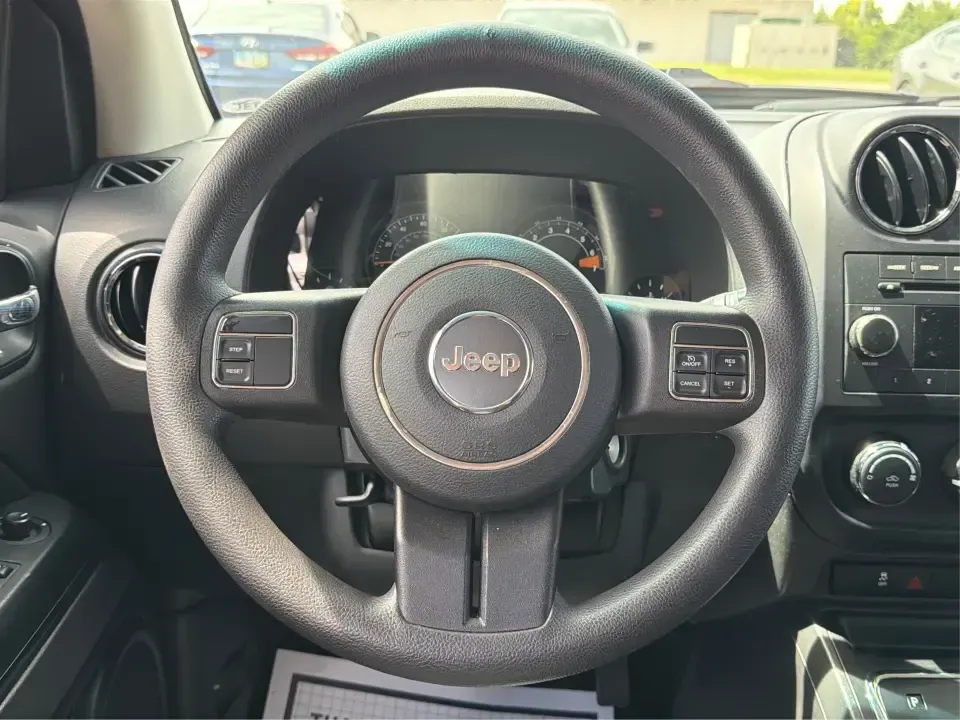 2015 Jeep Compass Sport FWD (1C4NJCBA6FD) with an 2.0L L4 DOHC 16V engine, located at 880 E. National Road, Vandalia, OH, 45377, (937) 908-9800, 39.891918, -84.183594 - Weekday commutes down I75, school drop-offs in Butler Township, and quick weekend getaways to the National Museum of the U.S. Air Force or Taylorsville MetroPark all call for an SUV that's easy to live with, comfortable for five, and efficient enough to keep your budget in check. This **2015 Jeep Co- Photo#16