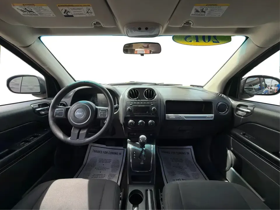 2015 Jeep Compass Sport FWD (1C4NJCBA6FD) with an 2.0L L4 DOHC 16V engine, located at 880 E. National Road, Vandalia, OH, 45377, (937) 908-9800, 39.891918, -84.183594 - Weekday commutes down I75, school drop-offs in Butler Township, and quick weekend getaways to the National Museum of the U.S. Air Force or Taylorsville MetroPark all call for an SUV that's easy to live with, comfortable for five, and efficient enough to keep your budget in check. This **2015 Jeep Co- Photo#20