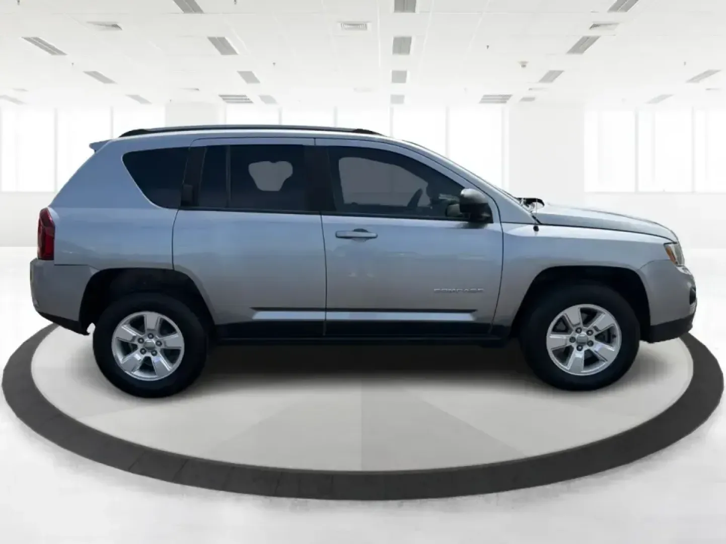 2015 Jeep Compass Sport FWD (1C4NJCBA6FD) with an 2.0L L4 DOHC 16V engine, located at 1951 S Dayton Lakeview Rd., New Carlisle, OH, 45344, (937) 908-9800, 39.890999, -84.050255 - Whether your week looks like a daily commute down I70, school drop-offs around Clark County, or a quick weekend escape to Buck Creek State Park, this **2015 Jeep Compass Sport FWD** is the kind of compact SUV that fits real life. With seating for **five**, easy-to-park sizing, and the versatile carg- Photo#1