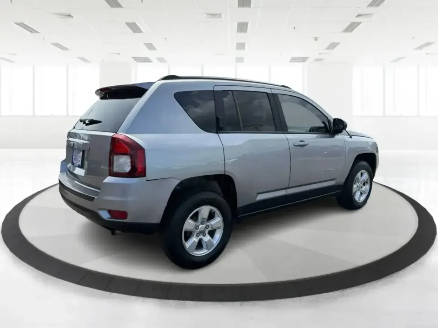 2015 Jeep Compass Sport FWD (1C4NJCBA6FD) with an 2.0L L4 DOHC 16V engine, located at 1951 S Dayton Lakeview Rd., New Carlisle, OH, 45344, (937) 908-9800, 39.890999, -84.050255 - Whether your week looks like a daily commute down I70, school drop-offs around Clark County, or a quick weekend escape to Buck Creek State Park, this **2015 Jeep Compass Sport FWD** is the kind of compact SUV that fits real life. With seating for **five**, easy-to-park sizing, and the versatile carg- Photo#2