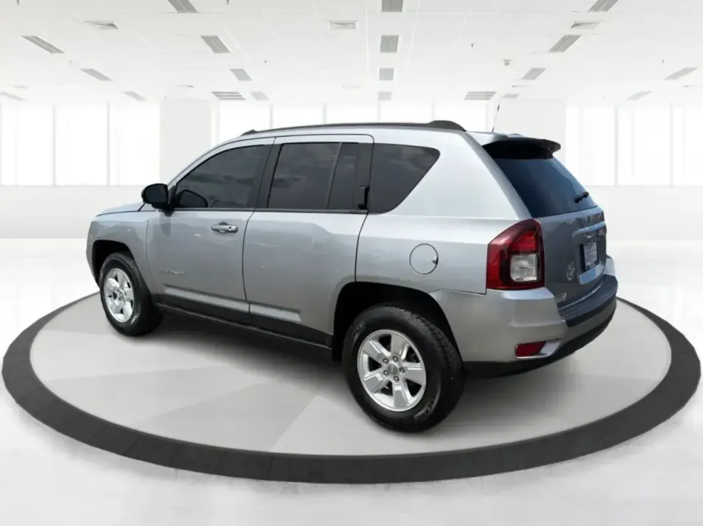 2015 Jeep Compass Sport FWD (1C4NJCBA6FD) with an 2.0L L4 DOHC 16V engine, located at 1951 S Dayton Lakeview Rd., New Carlisle, OH, 45344, (937) 908-9800, 39.890999, -84.050255 - Whether your week looks like a daily commute down I70, school drop-offs around Clark County, or a quick weekend escape to Buck Creek State Park, this **2015 Jeep Compass Sport FWD** is the kind of compact SUV that fits real life. With seating for **five**, easy-to-park sizing, and the versatile carg- Photo#4