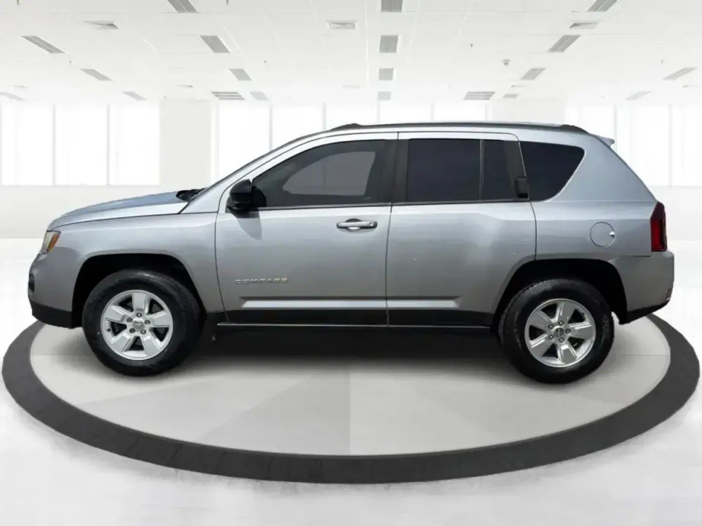 2015 Jeep Compass Sport FWD (1C4NJCBA6FD) with an 2.0L L4 DOHC 16V engine, located at 1951 S Dayton Lakeview Rd., New Carlisle, OH, 45344, (937) 908-9800, 39.890999, -84.050255 - Whether your week looks like a daily commute down I70, school drop-offs around Clark County, or a quick weekend escape to Buck Creek State Park, this **2015 Jeep Compass Sport FWD** is the kind of compact SUV that fits real life. With seating for **five**, easy-to-park sizing, and the versatile carg- Photo#5