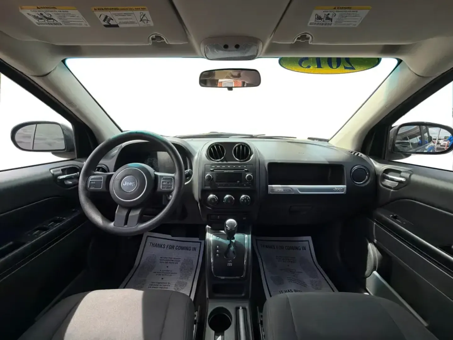2015 Jeep Compass Sport FWD (1C4NJCBA6FD) with an 2.0L L4 DOHC 16V engine, located at 1951 S Dayton Lakeview Rd., New Carlisle, OH, 45344, (937) 908-9800, 39.890999, -84.050255 - Whether your week looks like a daily commute down I70, school drop-offs around Clark County, or a quick weekend escape to Buck Creek State Park, this **2015 Jeep Compass Sport FWD** is the kind of compact SUV that fits real life. With seating for **five**, easy-to-park sizing, and the versatile carg- Photo#19