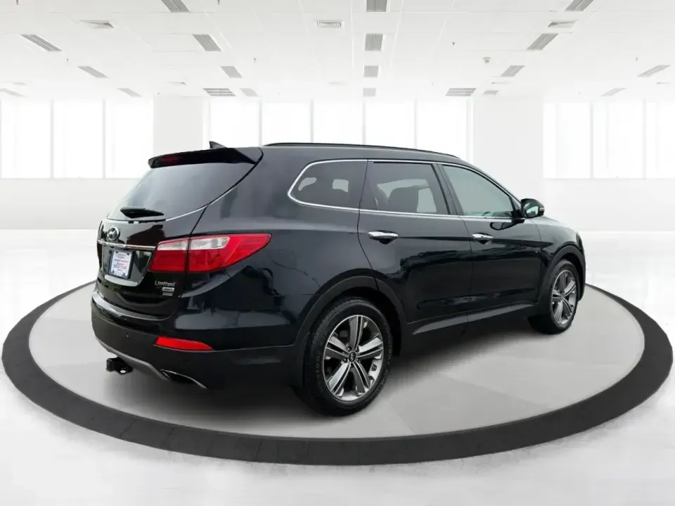 2014 Hyundai Santa Fe Limited AWD (KM8SRDHF4EU) with an 3.3L V6 DOHC 24V engine, 6-Speed Automatic transmission, located at 1230 East Main St, Xenia, OH, 45385, (937) 908-9800, 39.688026, -83.910172 - Picture your next weekend: loading up the family for a day at John Bryan State Park, heading out for youth sports in Beavercreek, or cruising I35 and US68 for an easy commute to Dayton. This 2014 Hyundai Santa Fe Limited AWD is built for real life in and around Xenia-roomy enough for growing familie- Photo#2
