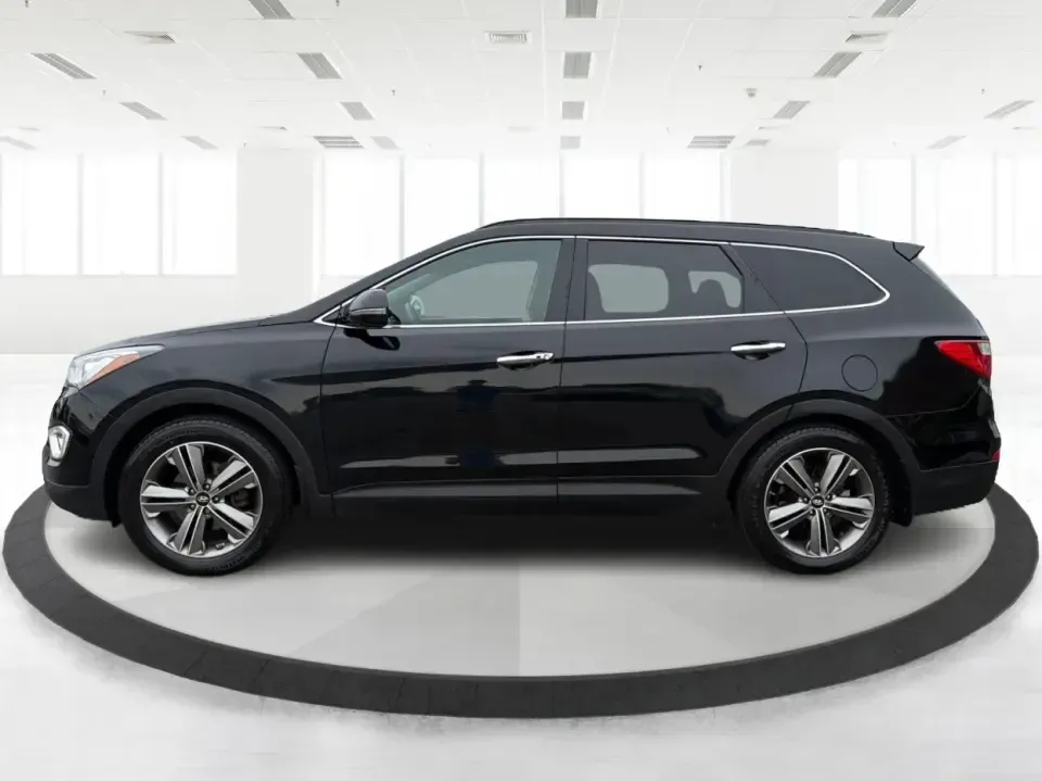 2014 Hyundai Santa Fe Limited AWD (KM8SRDHF4EU) with an 3.3L V6 DOHC 24V engine, 6-Speed Automatic transmission, located at 1230 East Main St, Xenia, OH, 45385, (937) 908-9800, 39.688026, -83.910172 - Picture your next weekend: loading up the family for a day at John Bryan State Park, heading out for youth sports in Beavercreek, or cruising I35 and US68 for an easy commute to Dayton. This 2014 Hyundai Santa Fe Limited AWD is built for real life in and around Xenia-roomy enough for growing familie- Photo#5