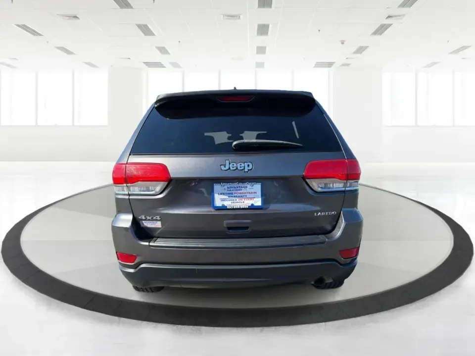 2014 Jeep Grand Cherokee Laredo 4WD (1C4RJFAG6EC) with an 3.6L V6 DOHC 24V engine, 5-Speed Automatic transmission, located at 1951 S Dayton Lakeview Rd., New Carlisle, OH, 45344, (937) 908-9800, 39.890999, -84.050255 - Whether your weekends look like family trips to Buck Creek State Park, winter drives along I70, or hauling gear for a day at George Rogers Clark Park, this 2014 Jeep Grand Cherokee Laredo 4WD is built for the kind of Ohio life that doesn't stop when the weather changes. With classic Jeep capability,- Photo#3