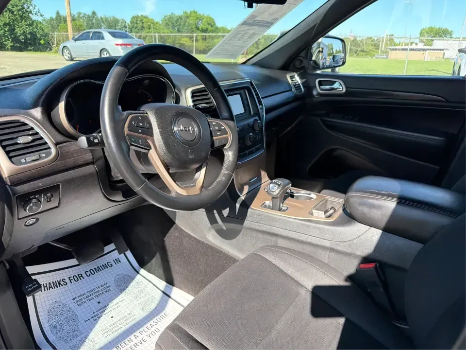 2014 Jeep Grand Cherokee Laredo 4WD (1C4RJFAG6EC) with an 3.6L V6 DOHC 24V engine, 5-Speed Automatic transmission, located at 1951 S Dayton Lakeview Rd., New Carlisle, OH, 45344, (937) 908-9800, 39.890999, -84.050255 - Whether your weekends look like family trips to Buck Creek State Park, winter drives along I70, or hauling gear for a day at George Rogers Clark Park, this 2014 Jeep Grand Cherokee Laredo 4WD is built for the kind of Ohio life that doesn't stop when the weather changes. With classic Jeep capability,- Photo#9
