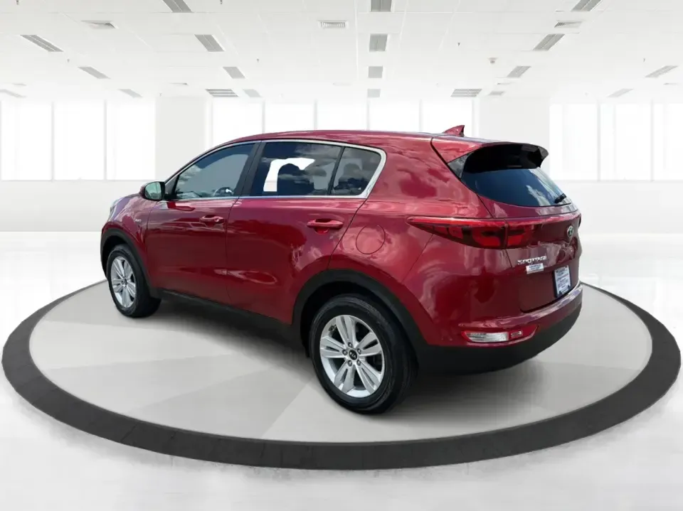 2018 Kia Sportage LX AWD (KNDPMCACXJ7) with an 2.4L V6 DOHC 24V engine, 6A transmission, located at 4508 South Dixie Dr, Moraine, OH, 45439, (937) 908-9800, 39.689976, -84.218452 - Need a capable crossover for Midwest weather, daily commutes, and spontaneous weekend plans-without the stress that can come with traditional lending? This **2018 Kia Sportage LX AWD** in bold **Hyper Red** fits an active Moraine/Dayton lifestyle, whether you're shuttling kids to practice, commuting- Photo#4