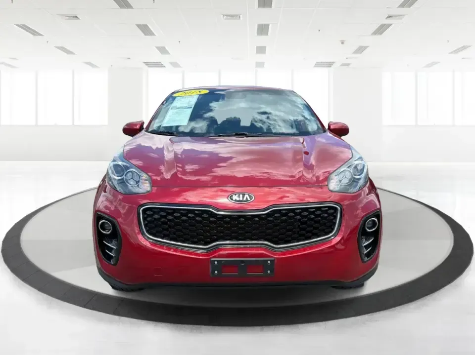 2018 Kia Sportage LX AWD (KNDPMCACXJ7) with an 2.4L V6 DOHC 24V engine, 6A transmission, located at 4508 South Dixie Dr, Moraine, OH, 45439, (937) 908-9800, 39.689976, -84.218452 - Need a capable crossover for Midwest weather, daily commutes, and spontaneous weekend plans-without the stress that can come with traditional lending? This **2018 Kia Sportage LX AWD** in bold **Hyper Red** fits an active Moraine/Dayton lifestyle, whether you're shuttling kids to practice, commuting- Photo#7