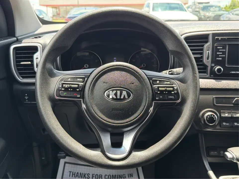 2018 Kia Sportage LX AWD (KNDPMCACXJ7) with an 2.4L V6 DOHC 24V engine, 6A transmission, located at 4508 South Dixie Dr, Moraine, OH, 45439, (937) 908-9800, 39.689976, -84.218452 - Need a capable crossover for Midwest weather, daily commutes, and spontaneous weekend plans-without the stress that can come with traditional lending? This **2018 Kia Sportage LX AWD** in bold **Hyper Red** fits an active Moraine/Dayton lifestyle, whether you're shuttling kids to practice, commuting- Photo#16