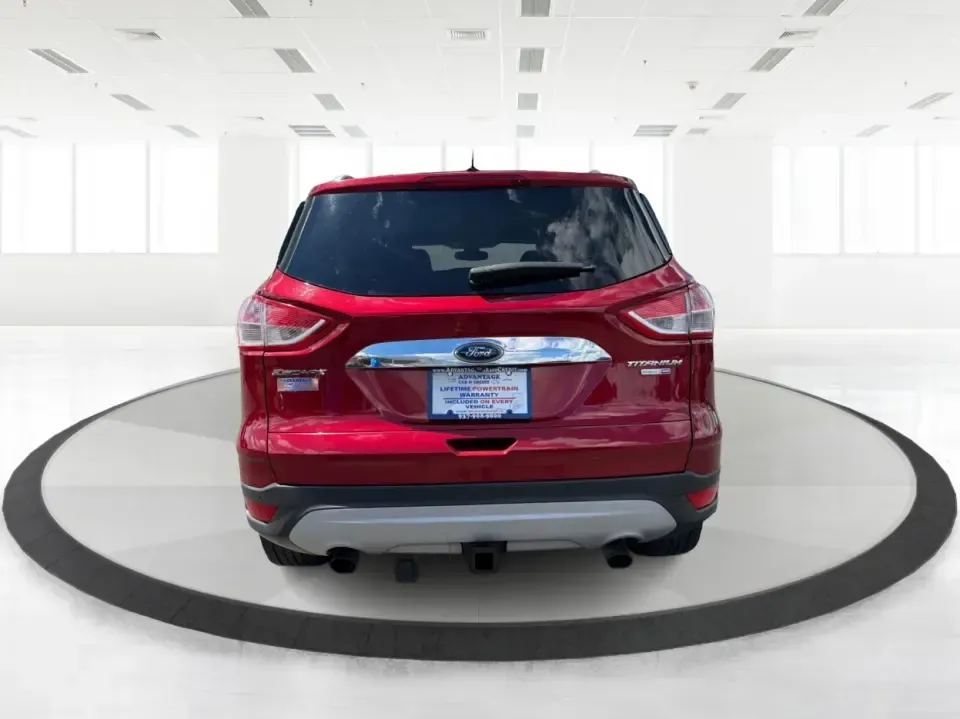 2014 Ford Escape Titanium 4WD (1FMCU9J91EU) with an 2.0L L4 DOHC 16V engine, 6-Speed Automatic transmission, located at 1099 N County Rd 25A , Troy, OH, 45373, (937) 908-9800, 40.057079, -84.212883 - Weekend getaways to Hocking Hills, snowy commutes up I75, or the everyday school-and-grocery loop around Troy-this 2014 Ford Escape Titanium 4WD is built for the kind of life that doesn't slow down when the weather changes. With seating for five, flexible cargo space, and confident four-wheel drive,- Photo#3